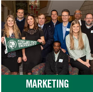 Marketing students smiling after a presentation